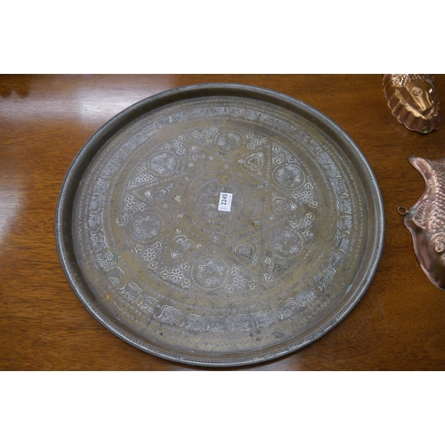 2245 - A round Islamic brass serving tray