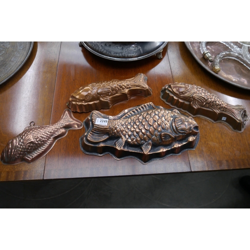 2249 - Four copper Jelly moulds of fish