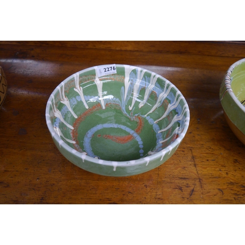 2276 - A green drip glazed bowl