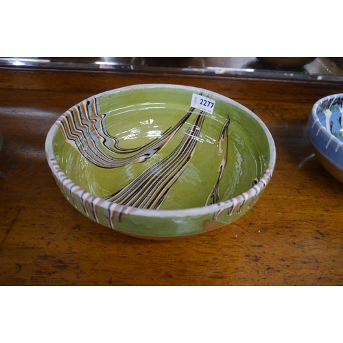 2277 - A green glazed bowl