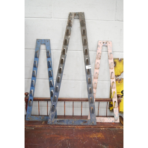 2348 - Three metal implement racks