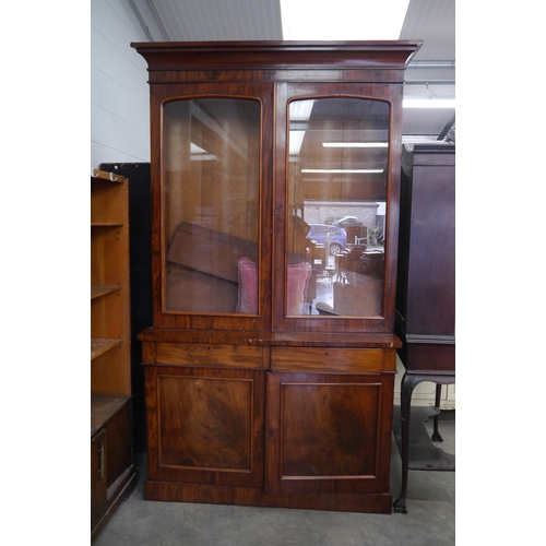 2357 - A large Victorian mahogany bookcase on cupboard