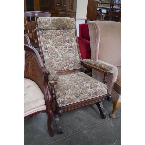 2368 - An Edwardian mahogany American rocking chair with tapestry upholstery