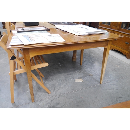 2381 - An Alfred Cox extending dining table