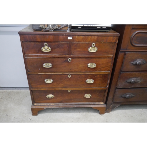 2395 - A Georgian mahogany two over three chest of drawers