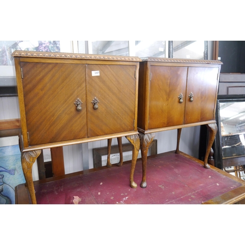 2407 - A near pair of 1930's walnut record cabinets