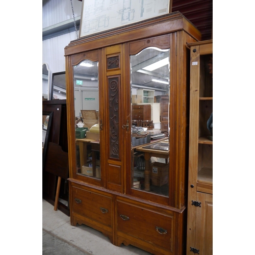 2413 - An Edwardian satinwood wardrobe