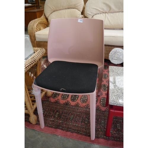 2449 - A pink plastic side chair