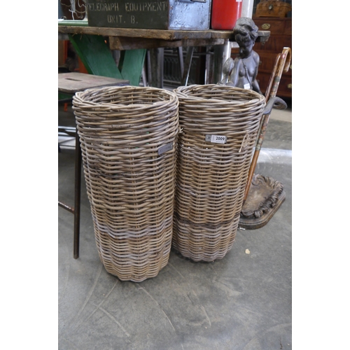 2009 - A pair of wicker umbrella stands