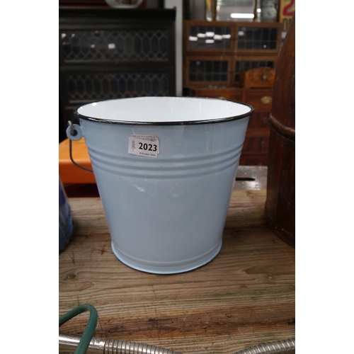 2023 - A blue enamel bucket