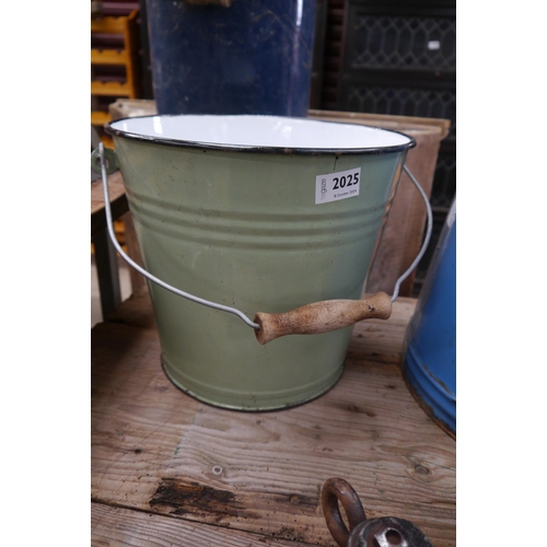 2025 - A green enamel bucket