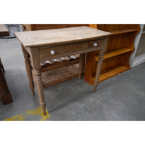 2317 - A Victorian pine side table with drawer and white porcelain knobs