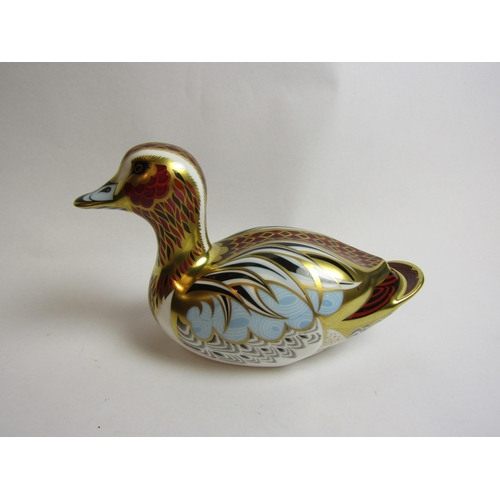 4342 - A Royal Crown Derby Collectors Guild Duck paperweight, gold stopper, 9cm tall