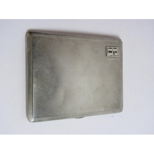 4346 - A silver cigarette case, engine-turned design and with 'PD' monogram cartouche, stamped Birmingham