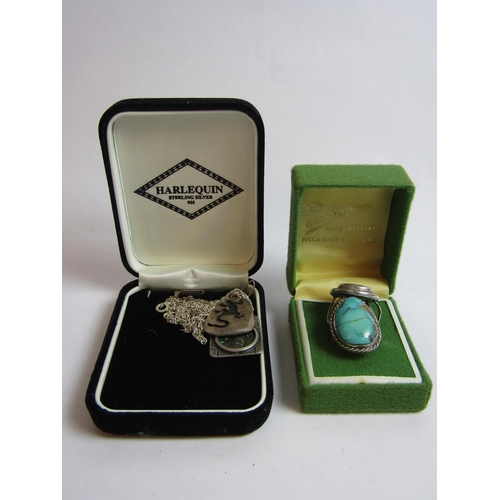 4358 - Two turquoise set rings, a modernistic pendant on chain of a lizard and another turquoise example