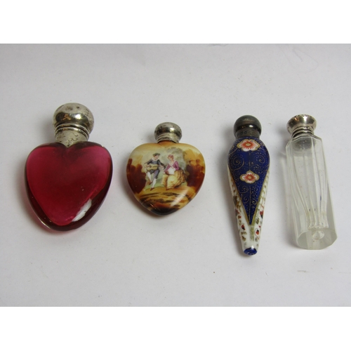 4363 - Four silver-capped perfume bottles including glass heart shaped example