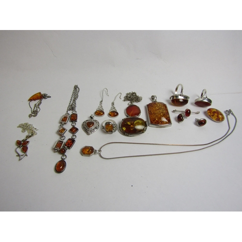 4370 - A collection of amber jewellery including rings, pendants, brooches, earrings, necklaces etc.