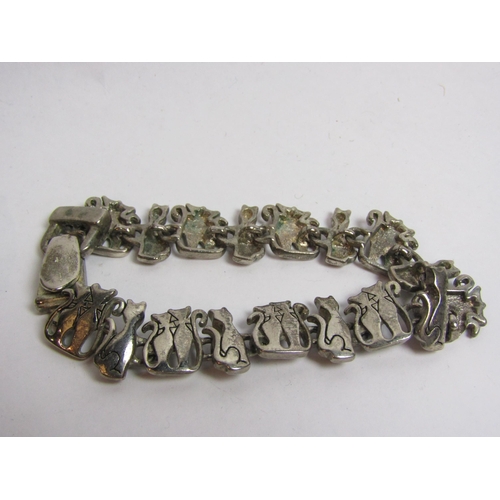 4380 - A silver panel bracelet stamped Sterling and another with cat motif