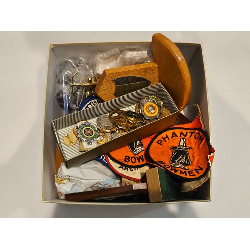 4432 - A box of archery medals, trophies and patches etc.