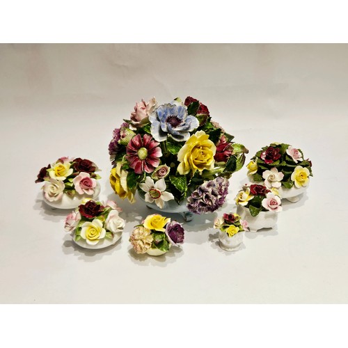 4439 - A large Adderley porcelain floral bouquet set in a shallow bowl on three scrolled feet together with... 