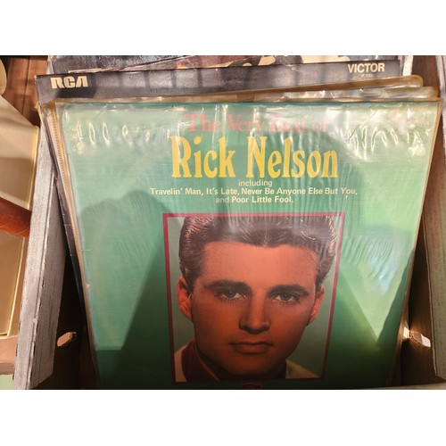 4442 - A box of mixed records including Elvis Costello, Frank Sinatra, Ricky Nelson, etc.