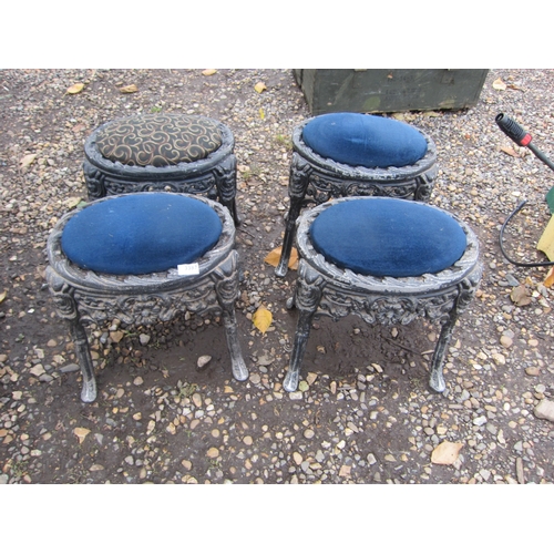 3387 - Four cast alloy stools