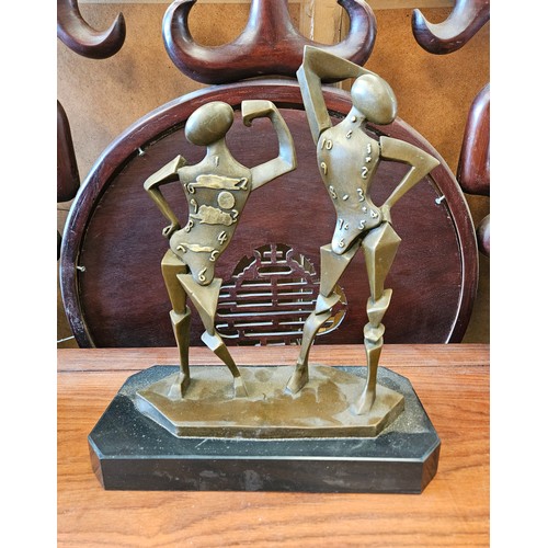 1115 - A bronze sculpture of Dalinean soldiers after Salvador Dali (1904-1989) on marble base. 35cm tall x ... 