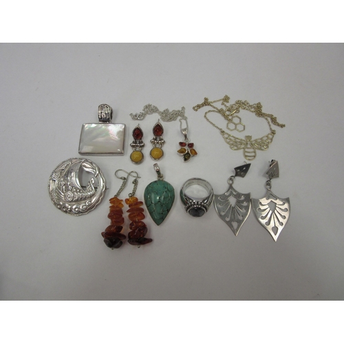 1302 - A collection of amber, turquoise and silver jewellery etc.