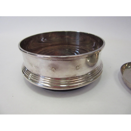 1305 - A silver and turned wood wine glass coaster together with a wine taster (2)