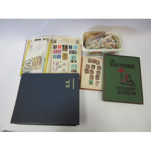 1310 - A collection of stamp albums and loose examples from Great Britain, penny black and reds, mainly 20t... 