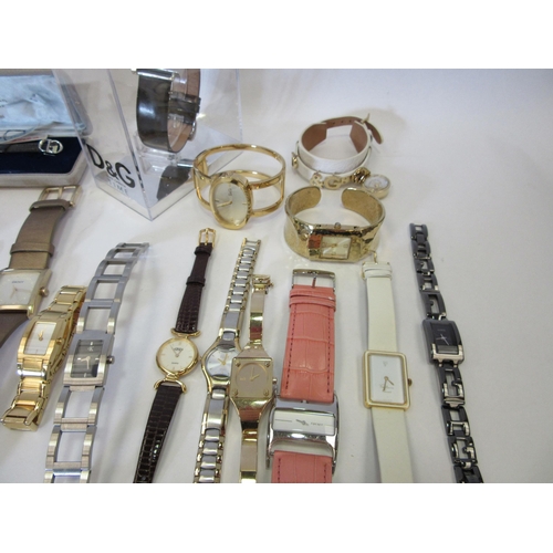 1324 - A selection of women's fashion watches including Christian Dior, Diesel, DKNY, Guess, CK, D&G, Chris... 