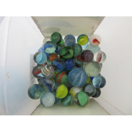 1331 - A collection of early 20th Century and later glass marbles including air twist examples