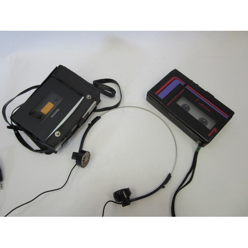 1332 - A vintage Walkman and a Fujino example together with a pair of headphones