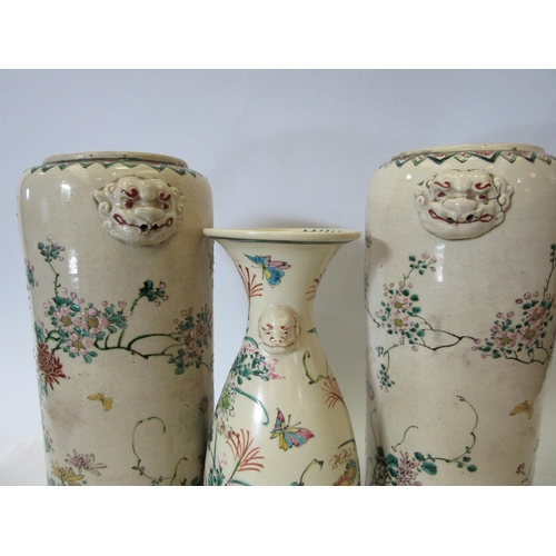 1338 - Three Japanese vases, cream ground with floral and wildlife decoration, two being a pair with inscri... 