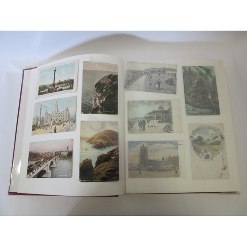 1344 - An album of mixed postcards including topographical, humorous and Royal