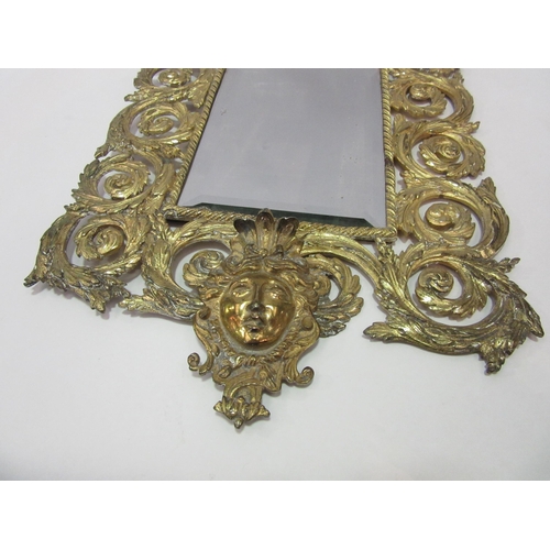 1360 - A gilt framed bevelled edged wall mirror, 12.5cm x 18.5cm