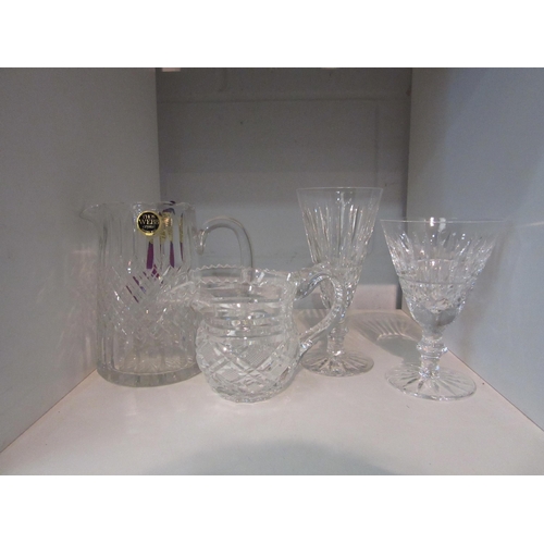 1371 - A Waterford Crystal jug, two wine glasses and a Thomas Webb jug (4)