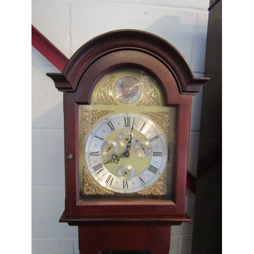 1006 - A 20th Century Metamec mahogany grandmother clock with three weights and a pendulum