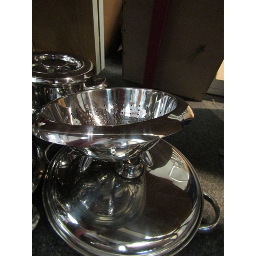 1030 - Four AGA lidded pans, a stainless steel colander and an Artame lidded cooking pot (6)