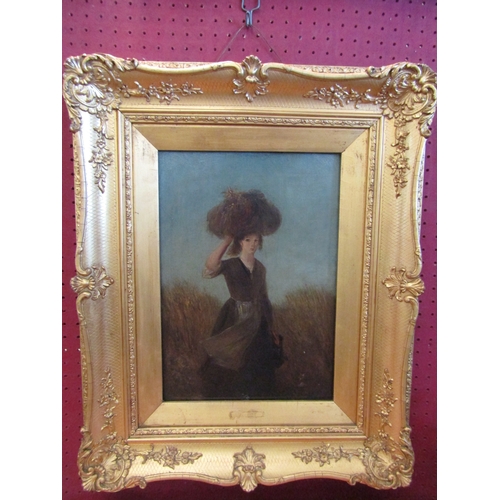 1035 - EDWARD ROBERT SMYTHE: An oil on canvas of a girl returning from gleaning.  Signed lower right.  Gilt... 