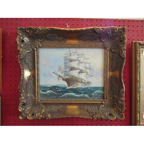 1054 - AMBROSE: An oil on canvas depicting a galleon at sea, signed lower right, antique style gilt frame, ... 