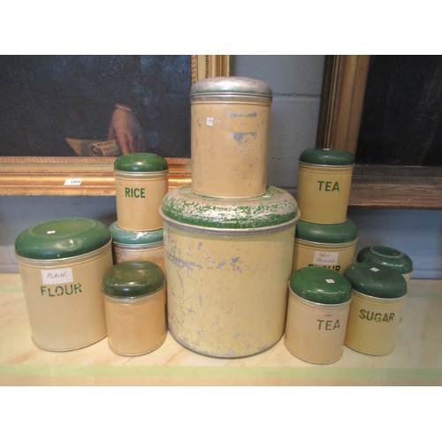 1067 - A collection of metal bygone kitchenalia storage jars including sugar, flour and tea (11)