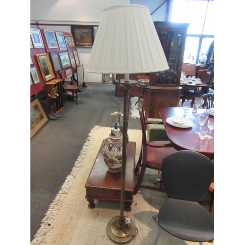 1079 - A pair of brass standard lamps, white pleated shades