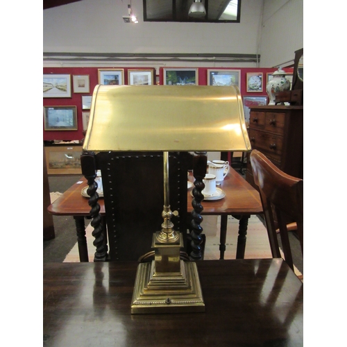 1088 - A brass banker's style desk lamp on stepped base