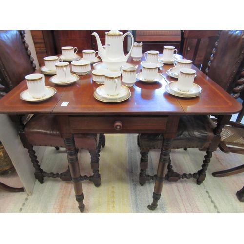 1091 - A late Georgian cross-banded mahogany Pembroke table with end drawer, on ring-turned legs