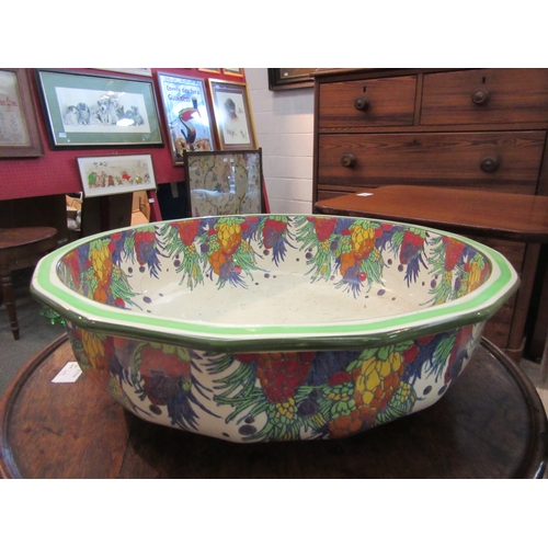 1093 - A Royal Doulton ceramic wash bowl with colourful fruit design, 40cm diameter