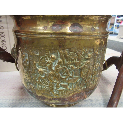 1095 - A large brass coal bucket with figural design and lion mask ring handles, 29cm tall x 30cm diameter