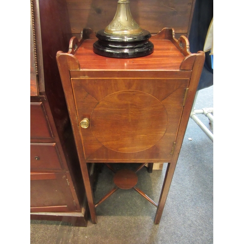 1100 - A Victorian mahogany pot cupboard with fret handles and under-tier, 81cm tall x 33cm wide x 33cm dee... 