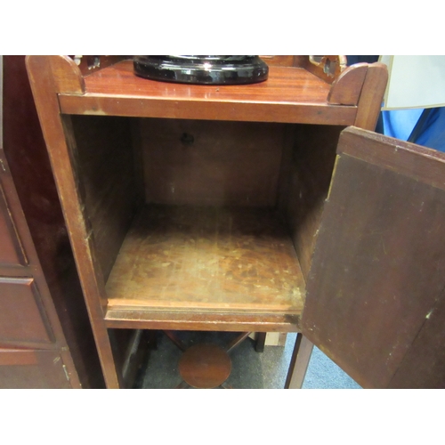 1100 - A Victorian mahogany pot cupboard with fret handles and under-tier, 81cm tall x 33cm wide x 33cm dee... 