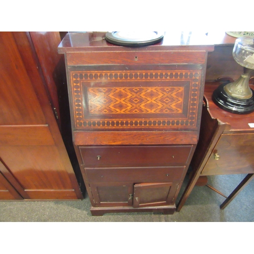 1102 - An early 20th Century oak student's bureau, with parquetry panel to the fall-front (a/f), 103cm tall... 